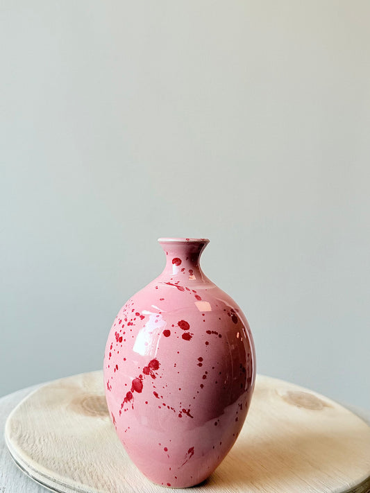 Rosa liten med rött